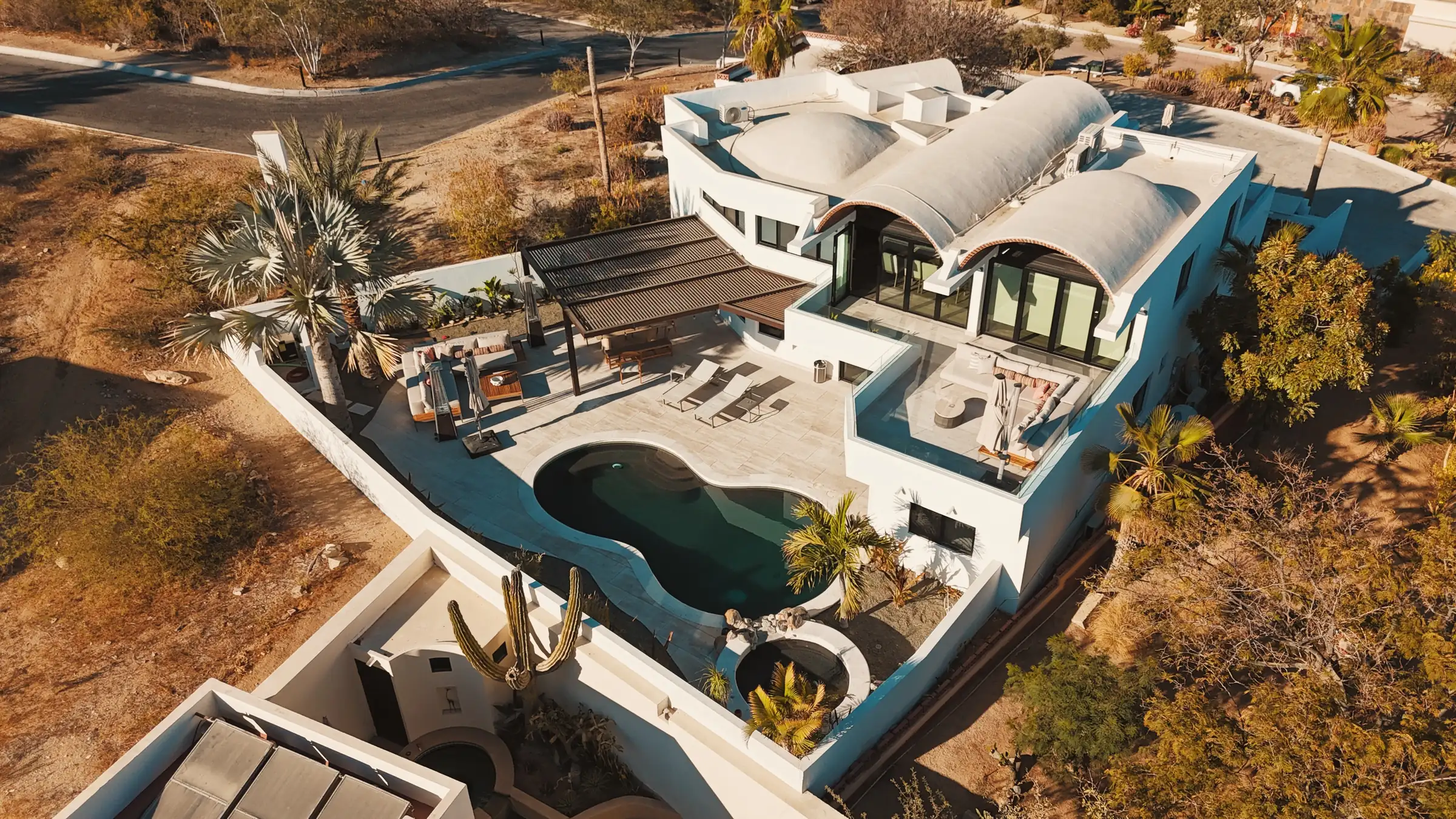 Aerial view of the villa and surrounding Cabo Bello community